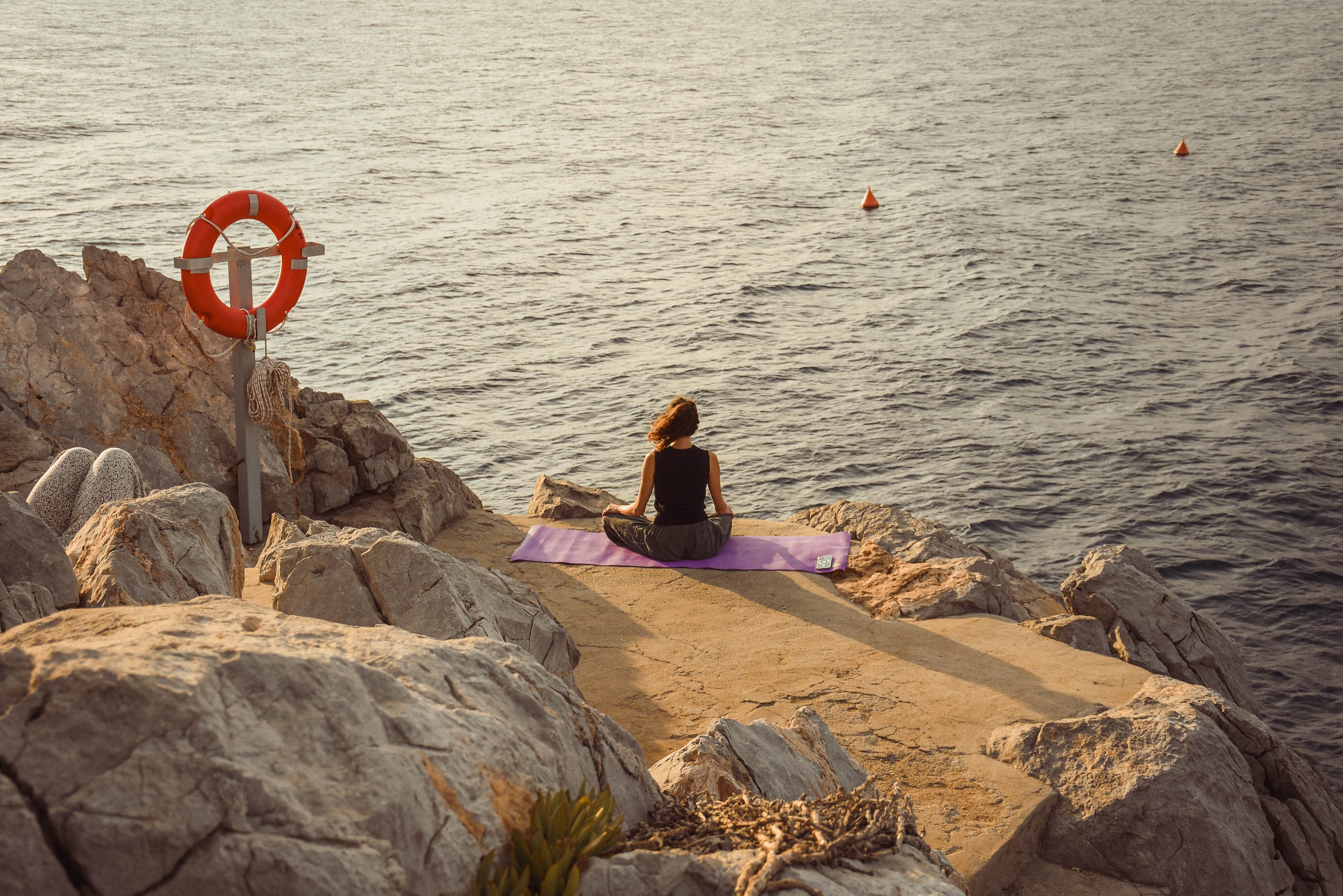 Meditation on coastal rocks