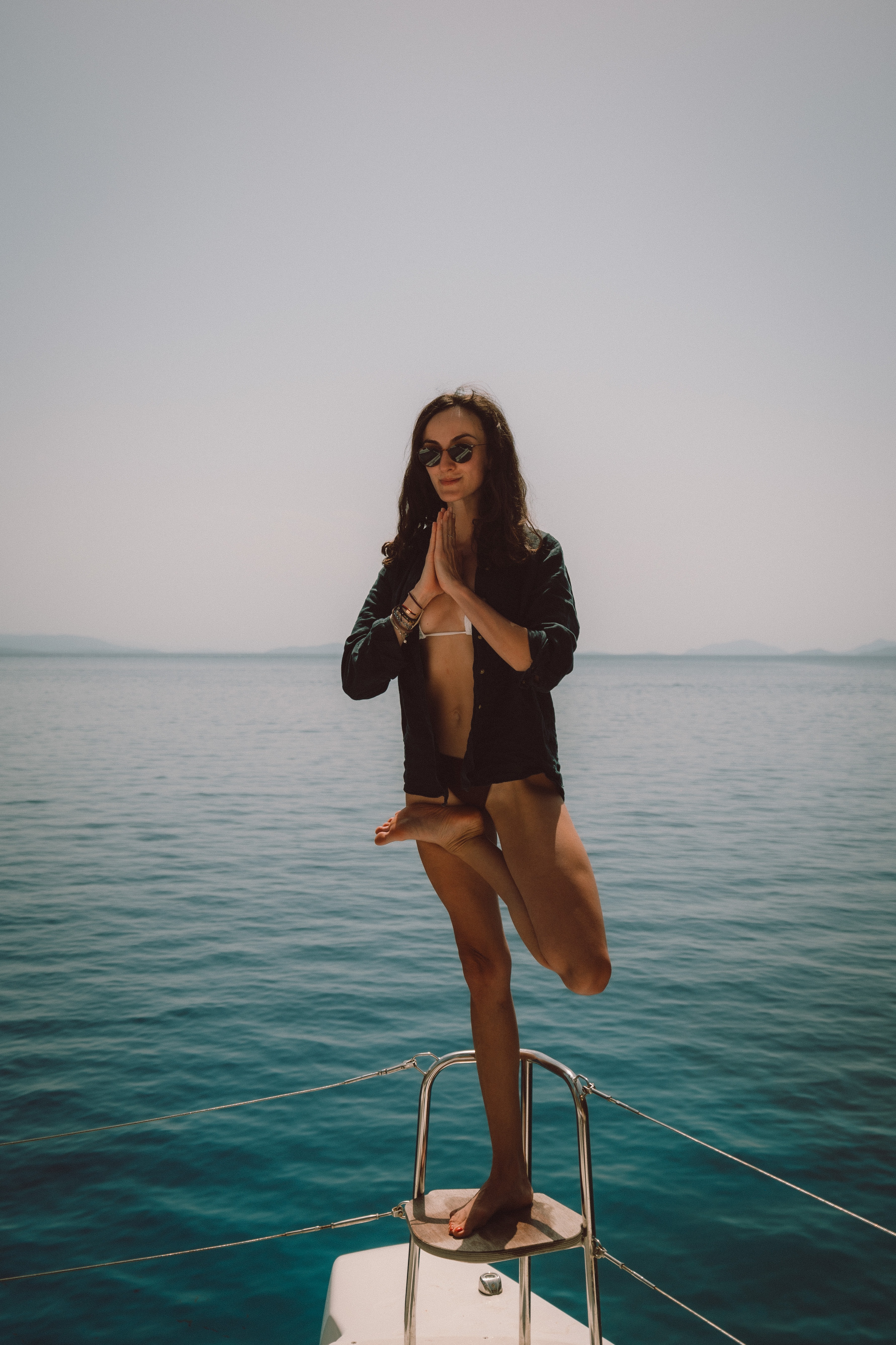 Tree pose on yacht